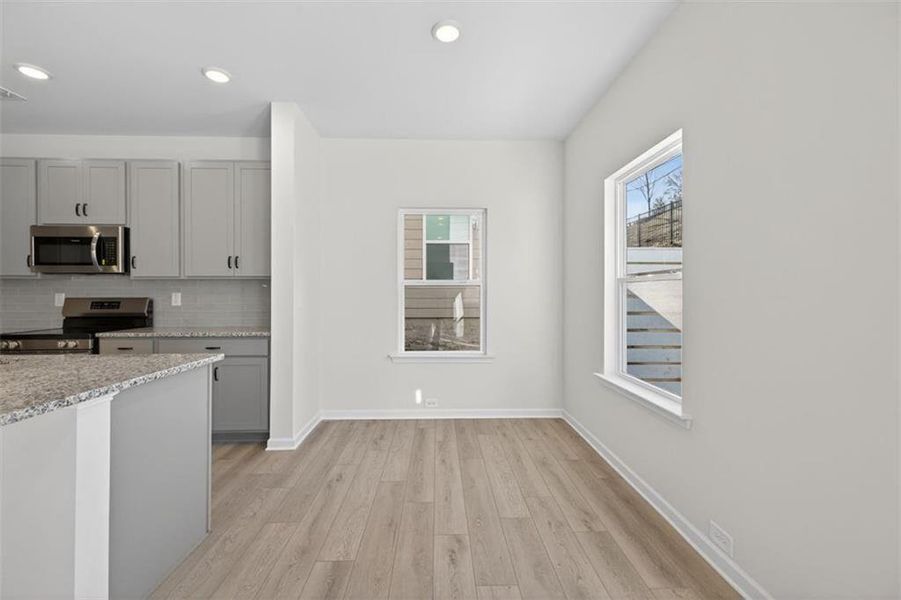 Spacious, unfurnished interior of a new home in Trinity Station, Auburn (Image 21).