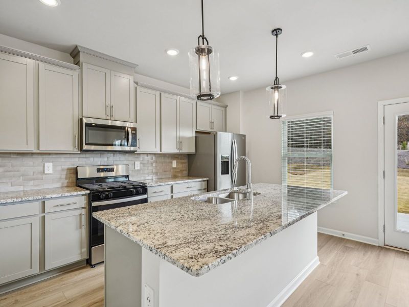 Furnished interior view inside a new home in Avalon - Reserve Series, Conyers (Image 5).