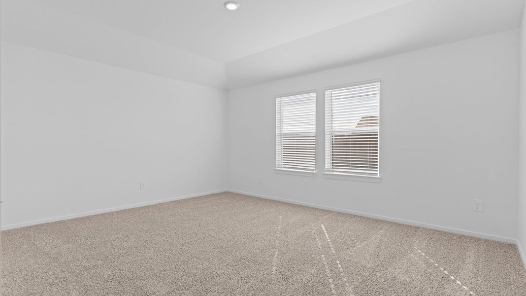 Spacious, unfurnished interior of a new home in Caldwell Crossing, Iowa Colony (Image 18).