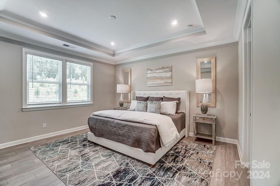 Primary Bedroom with Tray Ceiling-Similar to Subject Property