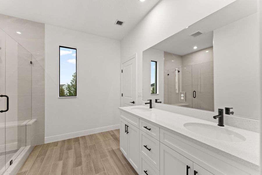 Furnished interior view inside a new home in Newfield - Rosette Park, Palm City (Image 7).