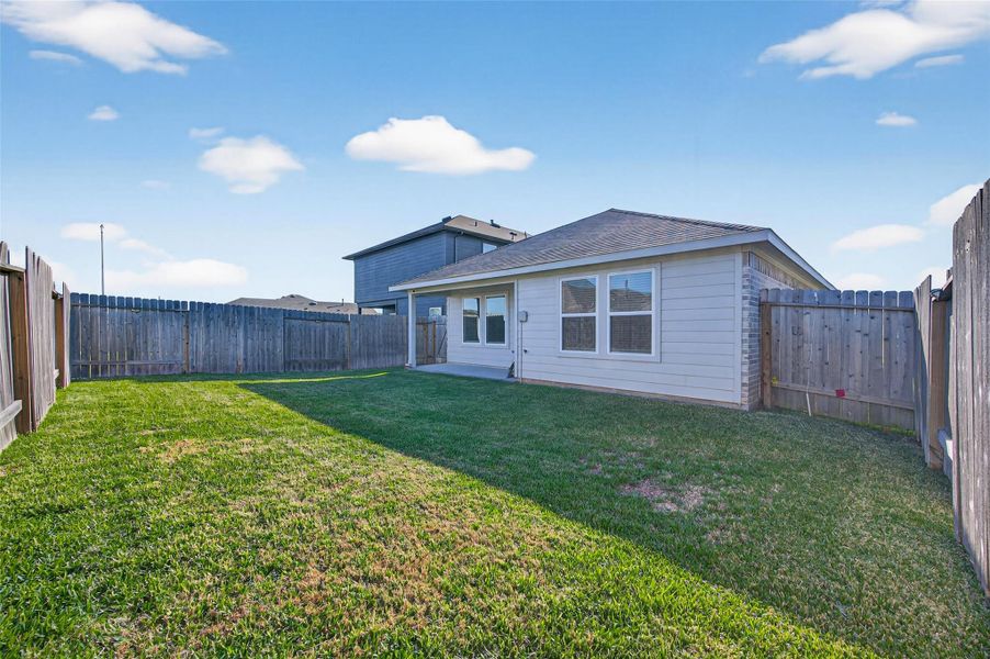 Exterior details and patio area of a home in , Spring (Image 27). Exterior details and patio area of a home in , Spring (Image 27).