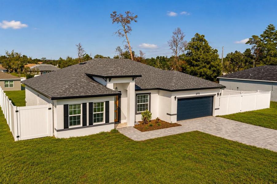 Front exterior of a new home in , Ocala, FL, highlighting curb appeal (Image 25). Front exterior of a new home in , Ocala, FL, highlighting curb appeal (Image 25).