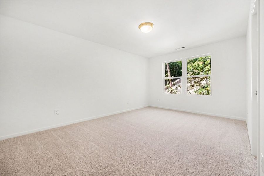 Spacious, unfurnished interior of a new home in Lake Royale, Louisburg (Image 18).