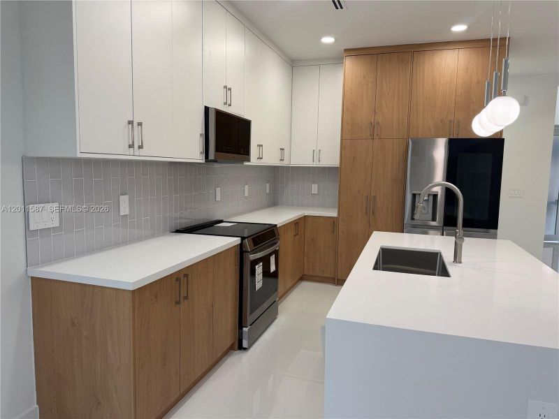 Furnished interior view inside a new home in , Lehigh Acres (Image 8).