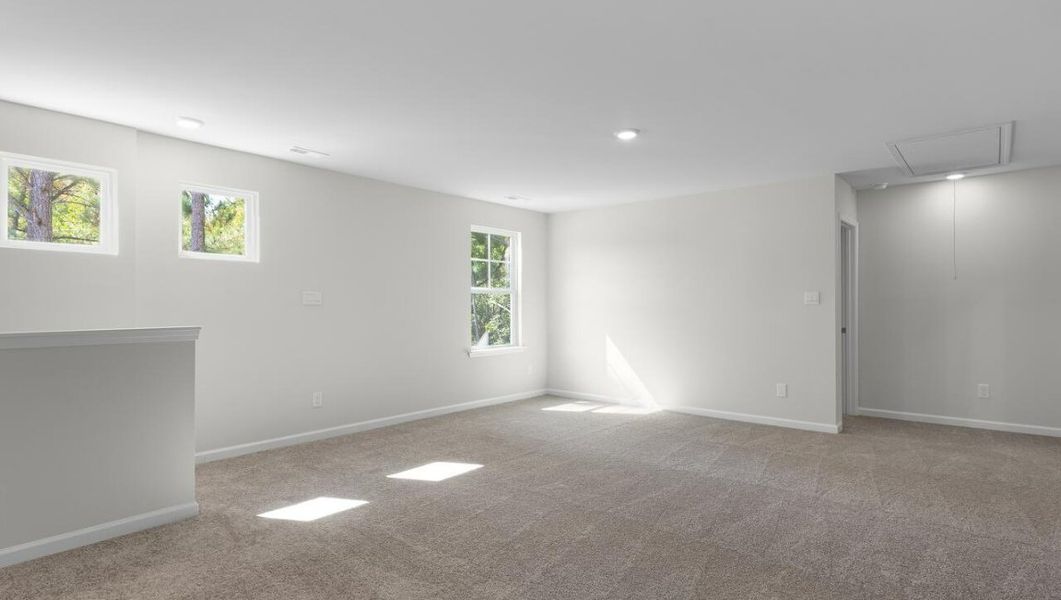 Spacious, unfurnished interior of a new home in The Preserve at Tidewater, Sneads Ferry (Image 22).
