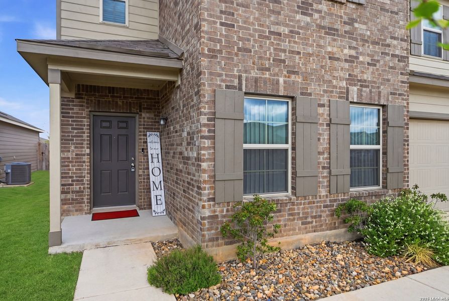 Exterior details and patio area of a home in Winding Brook, San Antonio (Image 23).