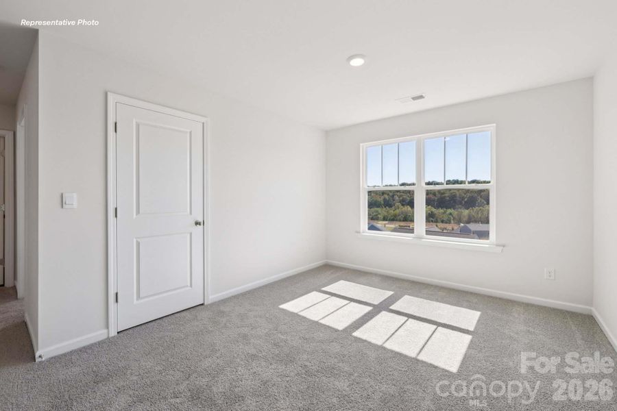 Spacious, unfurnished interior of a new home in Reedy Creek Preserve, Charlotte (Image 21).