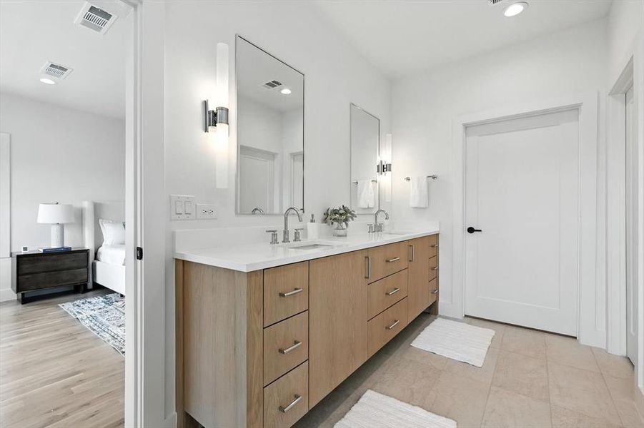 Ensuite bathroom with double vanity and recessed lighting Ensuite bathroom with double vanity and recessed lighting