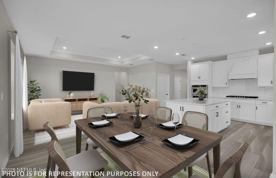 Furnished interior view inside a new home in Del Webb Wildlight, Yulee (Image 9).