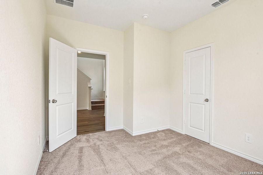Spacious, unfurnished interior of a new home in Woodside Farms, Seguin (Image 32).