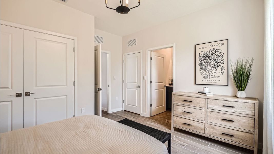 Representative furnished interior of a home built from the Grandcourt by D.R. Horton in Parker Pointe, Homestead (Image 13).