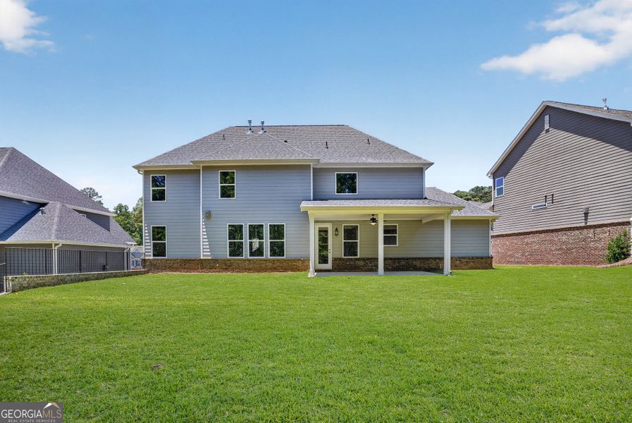 Exterior details and patio area of a home in The Manor at Gainesville Township, Gainesville (Image 20).