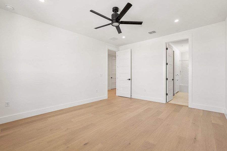 Spacious, unfurnished interior of a new home in Milky Way at River Place, Austin (Image 34).