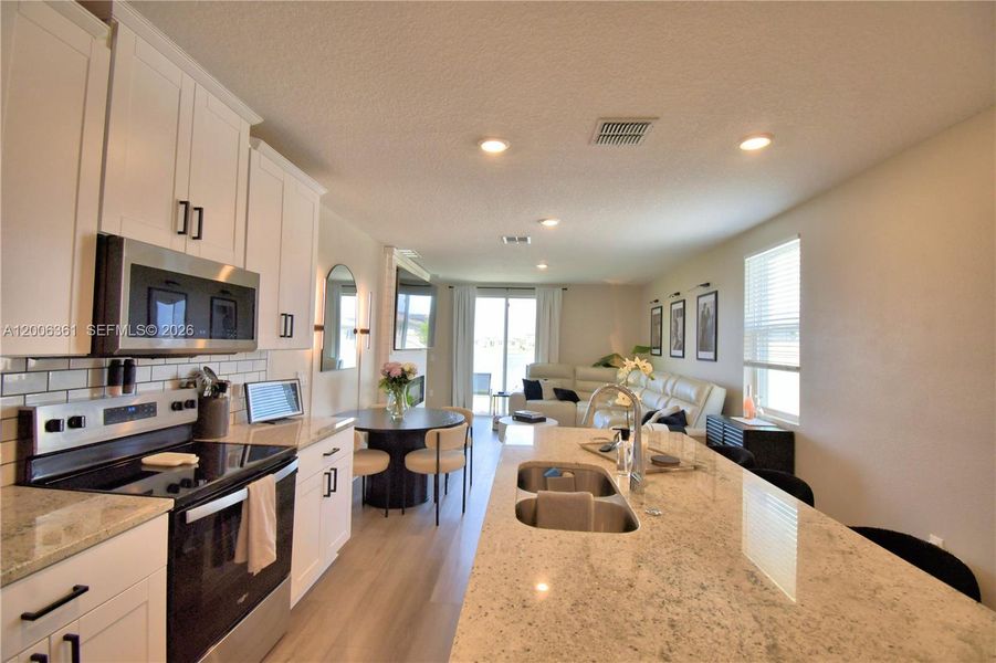 Furnished interior view inside a new home in Lake Deer Estates - Classic Series, Kissimmee (Image 30).