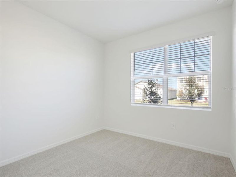 Spacious, unfurnished interior of a new home in Coasterra - Reserve Series, Palmetto (Image 9).