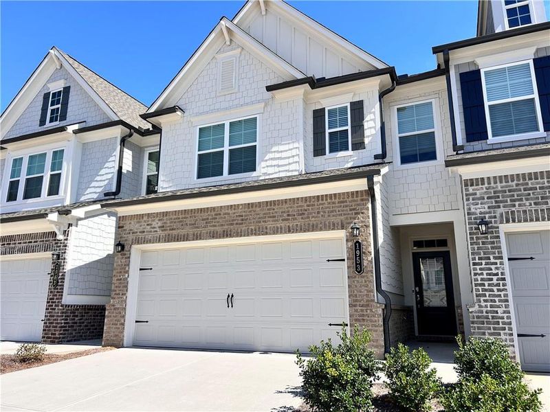 Exterior details and patio area of a home in , Suwanee (Image 25).