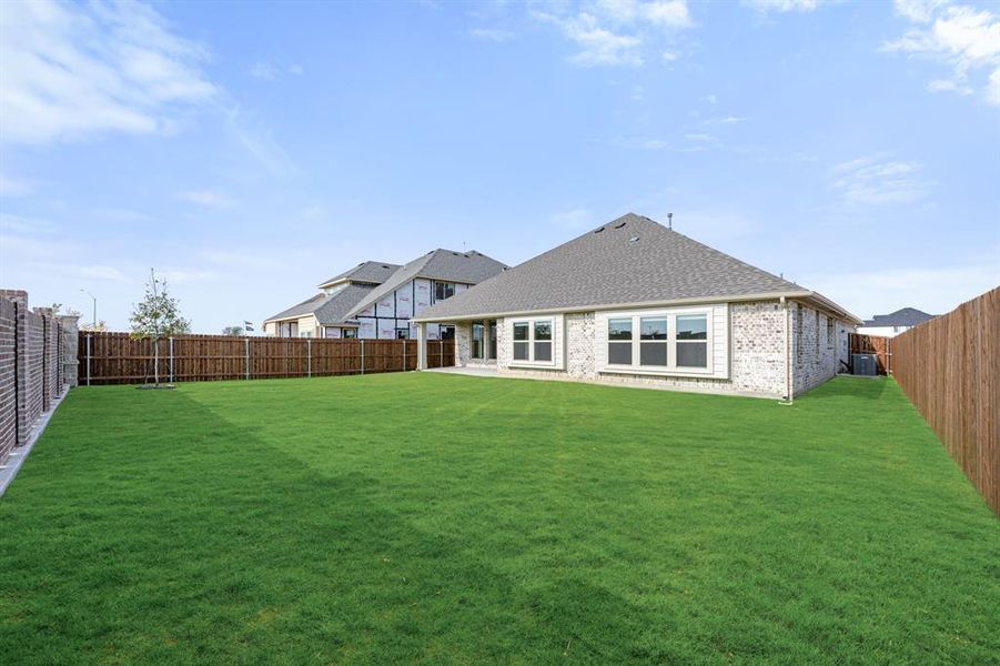 Exterior details and patio area of a home in Wildflower Ranch 60-65, Fort Worth (Image 4). Exterior details and patio area of a home in Wildflower Ranch 60-65, Fort Worth (Image 4).