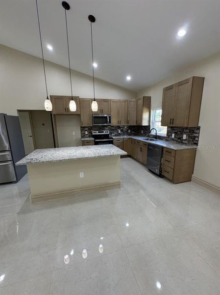 Furnished interior view inside a new home in , Okeechobee (Image 10).