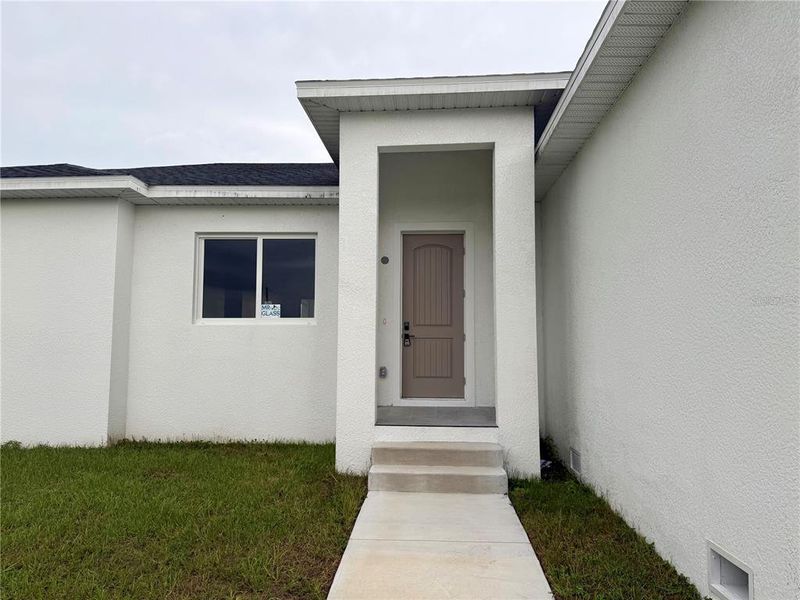 Exterior details and patio area of a home in , Port Charlotte (Image 3). Exterior details and patio area of a home in , Port Charlotte (Image 3).