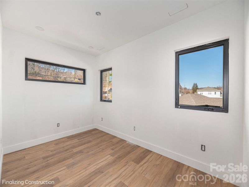 Spacious, unfurnished interior of a new home in , Waynesville (Image 8).