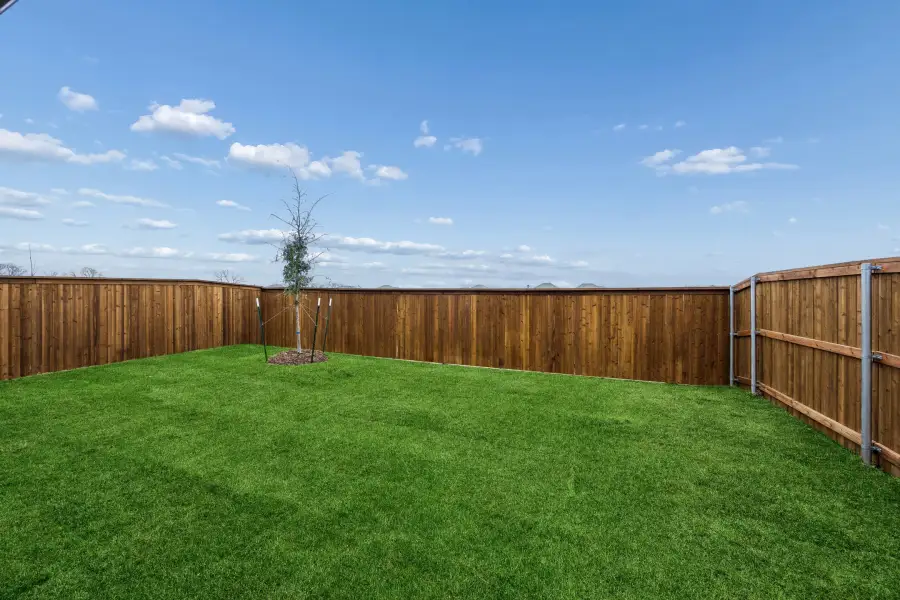 Yard in the Cedar home plan by Trophy Signature Homes – REPRESENTATIVE PHOTO Yard in the Cedar home plan by Trophy Signature Homes – REPRESENTATIVE PHOTO