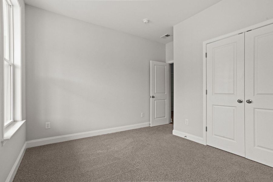 Spacious, unfurnished interior of a new home in High Point at Foxbank, Moncks Corner (Image 21).