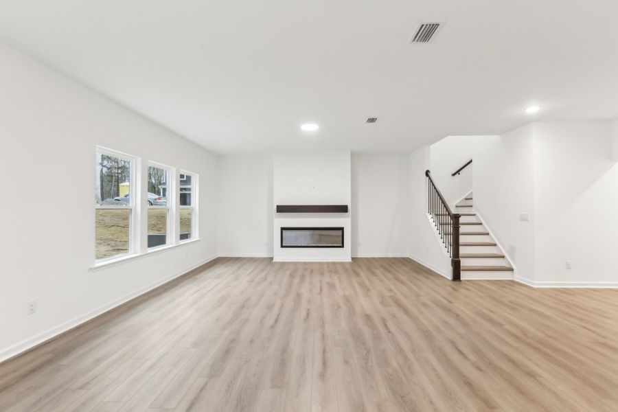 Representative unfurnished interior of a home built from the Alexis by Ashton Woods in Rowland's Grant, Fuquay Varina (Image 39).