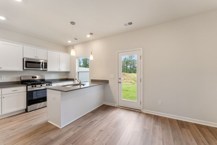 Furnished interior view inside a new home in Edwards Station, Taylors (Image 5).