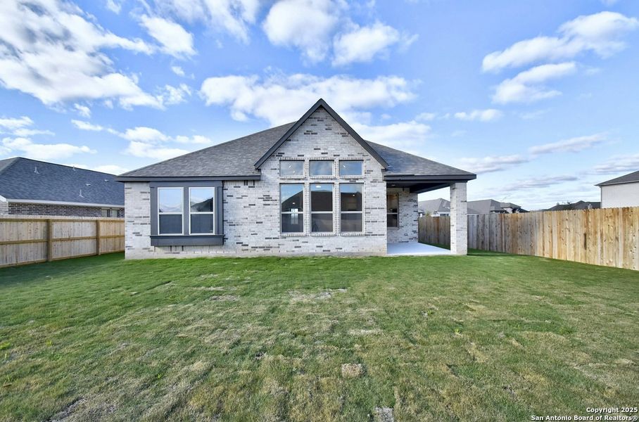 Front exterior of a new home in Alsatian Oaks: 50ft. lots, Castroville, TX, highlighting curb appeal (Image 1). Front exterior of a new home in Alsatian Oaks: 50ft. lots, Castroville, TX, highlighting curb appeal (Image 1).