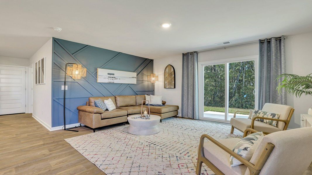 Representative furnished interior of a home built from the ROBIE by D.R. Horton in Longleaf Village, Rincon (Image 16).