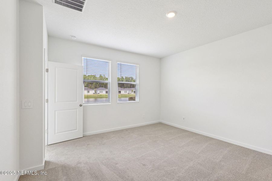 Spacious, unfurnished interior of a new home in Cypress Meadows - Classic Series, Jacksonville (Image 19).