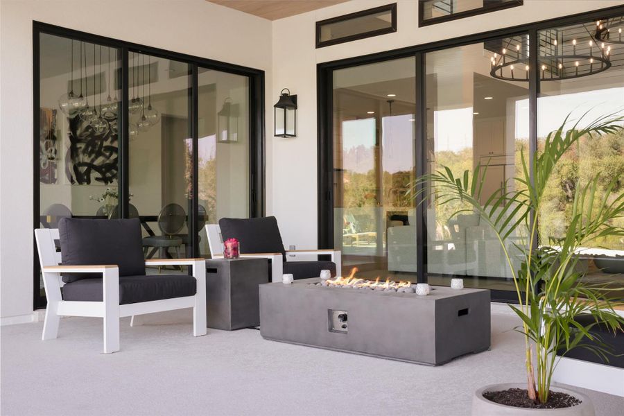 Designed for both leisure and gourmet grilling, the patio features a state-of-the-art BBQ with smoker and an outdoor sink