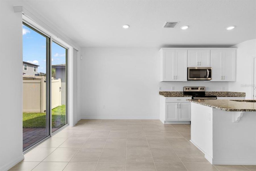 Furnished interior view inside a new home in Lawson Dunes - Signature Series, Haines City (Image 9).