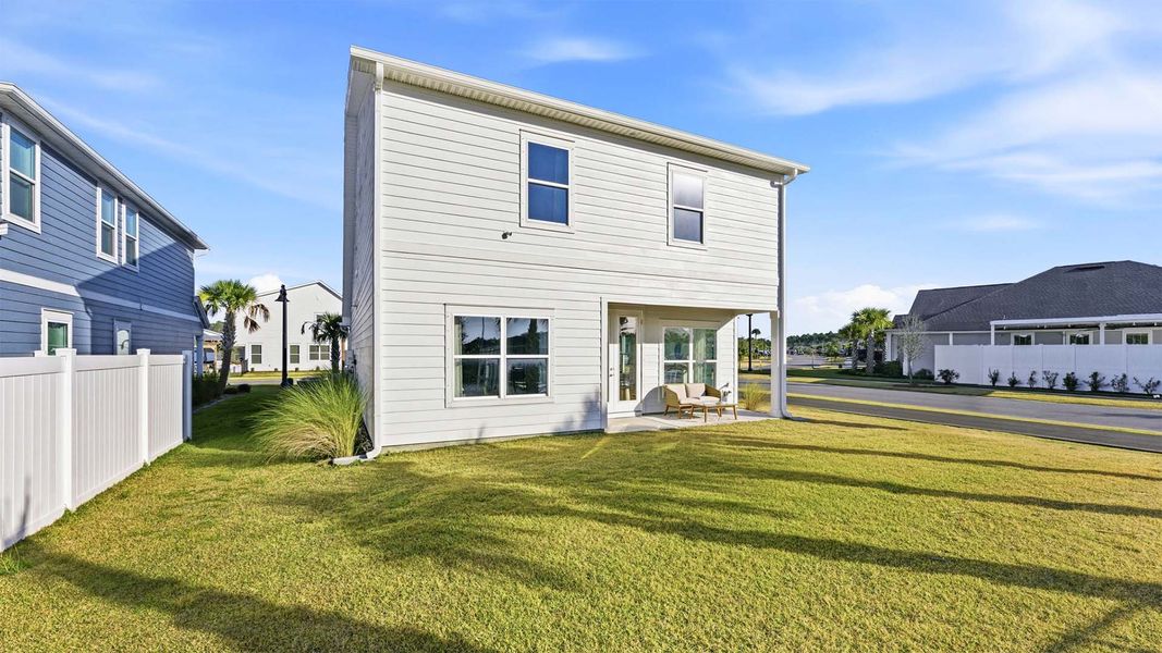 Exterior details and patio area of a home in Breakfast Point East Phase I, Panama City Beach (Image 24).