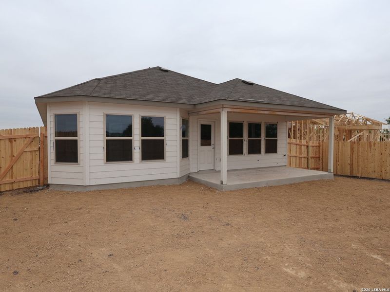 Exterior details and patio area of a home in Verano Farms, Von Ormy (Image 19).