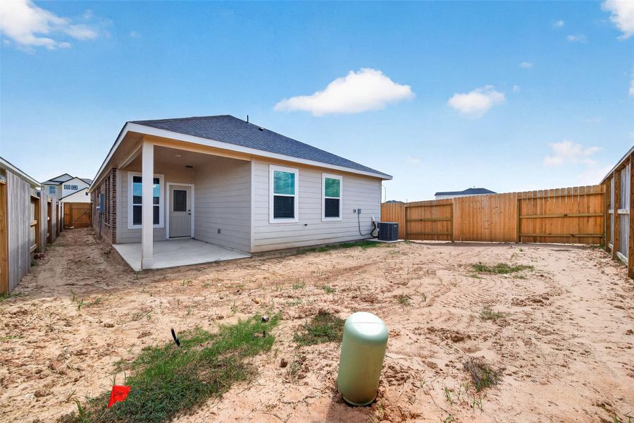 Exterior details and patio area of a home in La Segarra, Brookshire (Image 25).