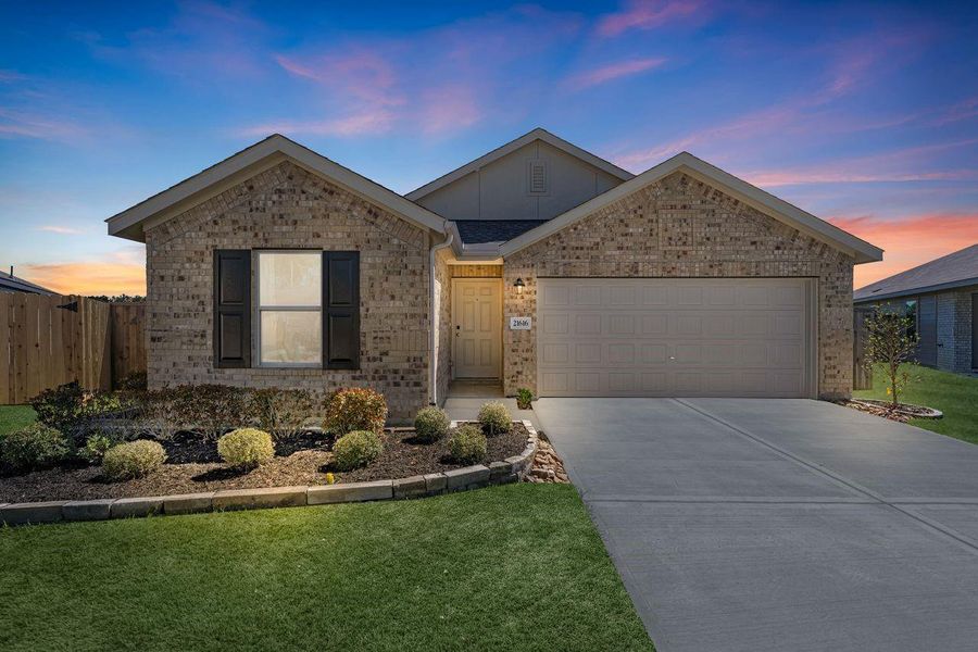 Front exterior of a new home in , New Caney, TX, highlighting curb appeal (Image 1). Front exterior of a new home in , New Caney, TX, highlighting curb appeal (Image 1).