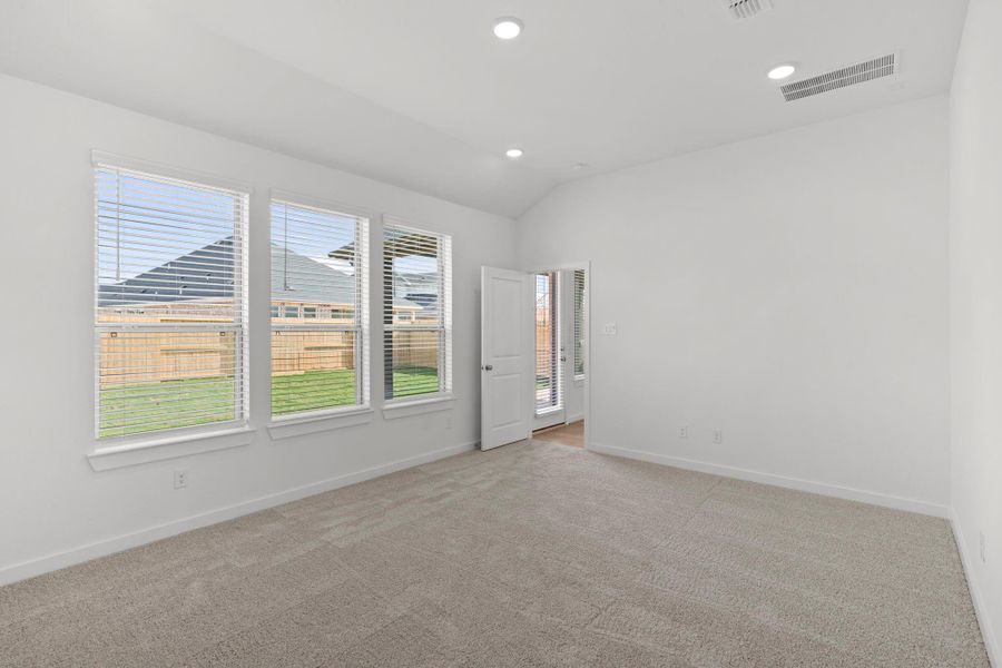 Main Bedroom Oasis With Cozy Ambiance And Natural Light