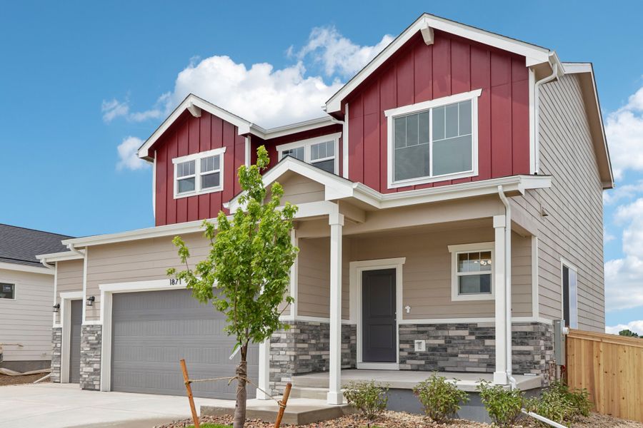 Front exterior of a new home in Granary, Johnstown, CO, highlighting curb appeal (Image 20). Front exterior of a new home in Granary, Johnstown, CO, highlighting curb appeal (Image 20).