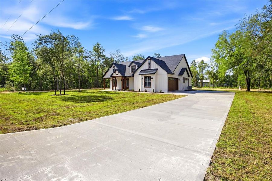 Front exterior of a new home in , Dunnellon, FL, highlighting curb appeal (Image 25). Front exterior of a new home in , Dunnellon, FL, highlighting curb appeal (Image 25).