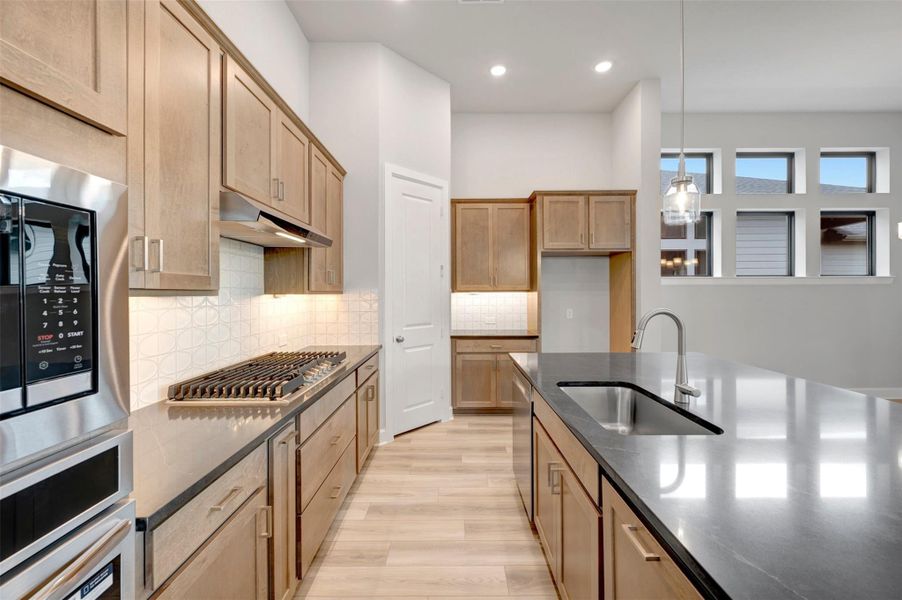 Furnished interior view inside a new home in Sienna - Landmark Row Collection, Missouri City (Image 9).