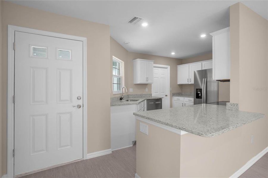 Furnished interior view inside a new home in , Floral City (Image 5).