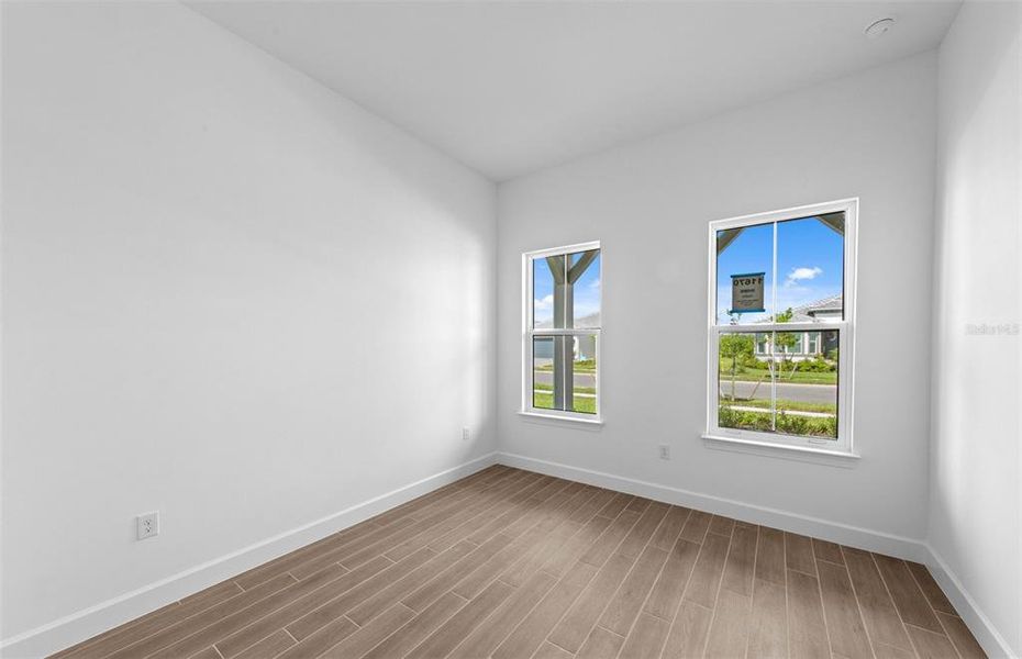 Spacious, unfurnished interior of a new home in BeachWalk by Manasota Key, Englewood (Image 19).