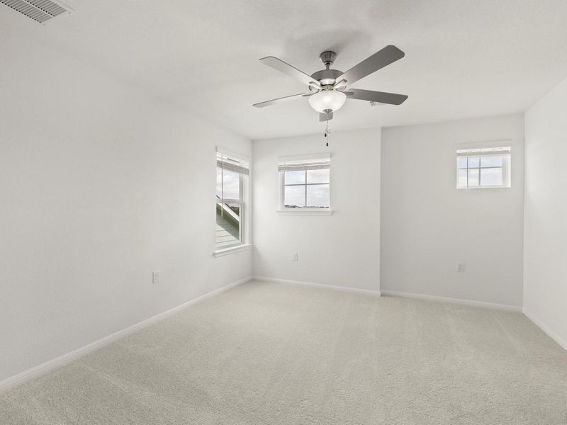 Well-lit and tranquil, this adaptable room provides a serene escape for relaxation or creative pursuits.