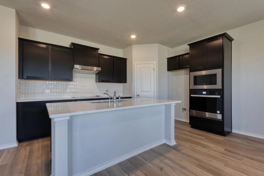 Representative furnished interior of a home built from the Dunlap by Ashton Woods in Meadows at Hennersby Hollow 40's, San Antonio (Image 5).