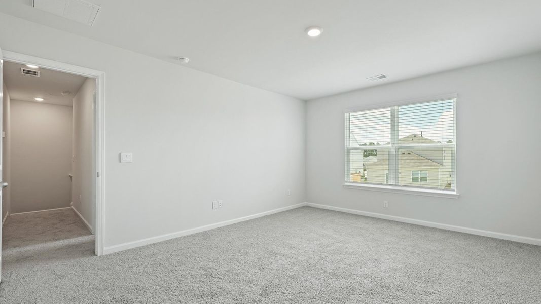 Spacious, unfurnished interior of a new home in Pine Hills at Cane Bay, Summerville (Image 19).