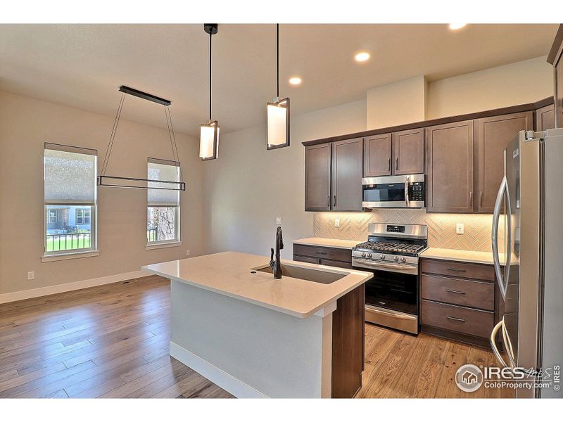 Kitchen Lighting and Plumbing Fixtures Have Been Upgraded