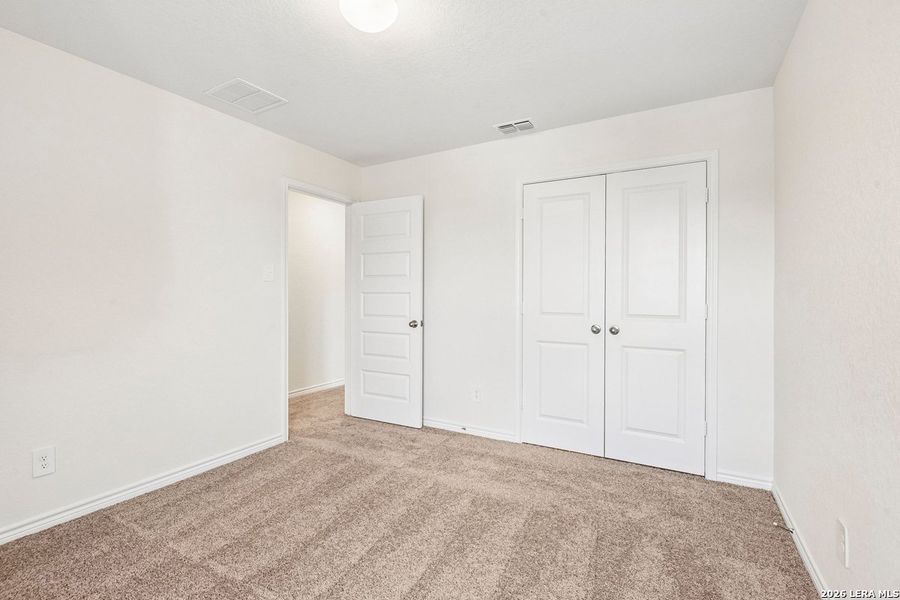 Spacious, unfurnished interior of a new home in Woodside Farms, Seguin (Image 37).