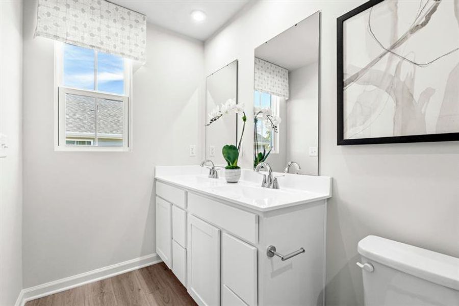 Representative furnished interior of a home built from the Woodford by Ryan Homes in Oakwood Trace, Fairburn (Image 28).